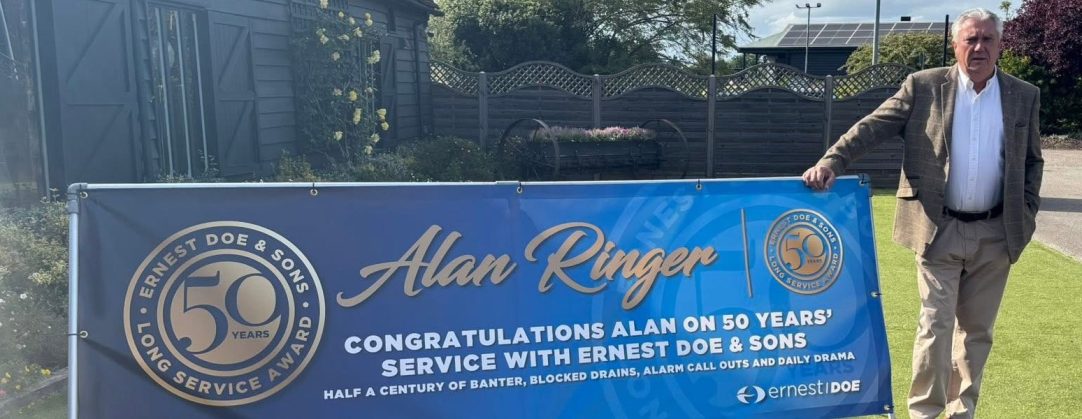 Alan with banner website